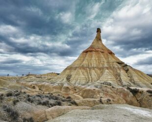 storm clouds over bardenas reales desert spain